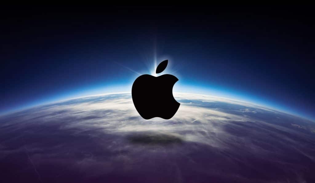 The image shows the Apple logo in black, centered over the curvature of the Earth from space. The Earth appears with a blue horizon blending into the dark space above, creating a surreal scene where the logo seems to be hovering above the planet; rumors suggest it might hint at a foldable iPhone.