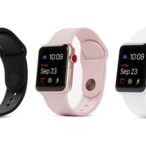 Three Apple Watch Series 3 smartwatches are displayed in a row, showing the same time (10:09) and date (Friday, Sep 23). From left to right, they feature black, pink, and white wristbands. Each watch screen shows icons for messages, weather, and fitness apps to track skiing or snowboarding activities.