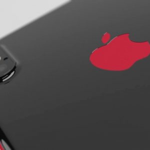 Close-up of the upper rear part of a PRODUCT(RED) iPhone X with a red Apple logo, featuring a dual-lens camera on the top left with a flash. The edges of the phone are also highlighted in red. The background is a soft gradient of light grey, showcasing elegant iPhone X design.