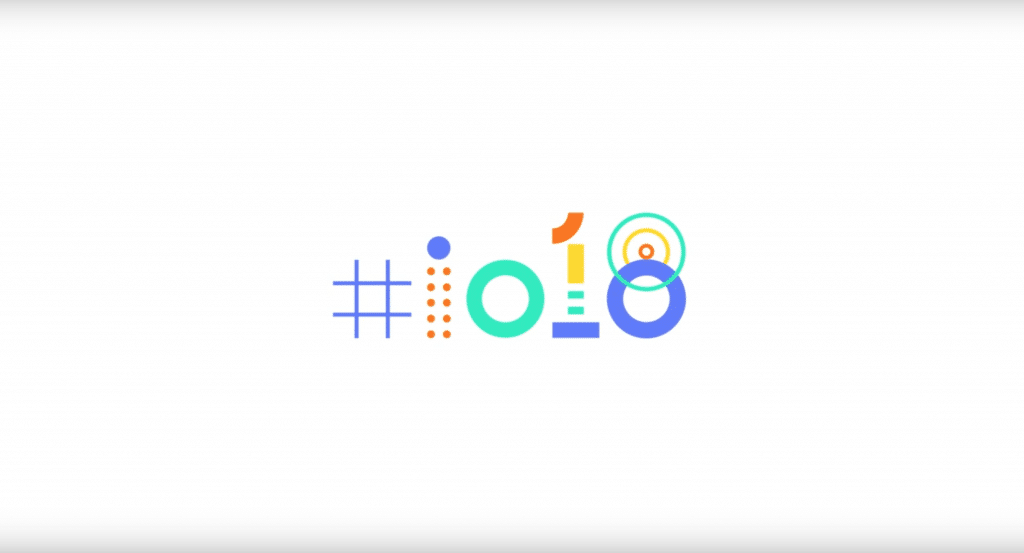 A white background features the text "#io18" in a stylized font. The hashtag is blue, the "i" is blue with an orange dot, the "o" is green, the number "1" is orange, and the "8" is comprised of two blue circles with a green circle around the first. Don't miss highlights from Google I/O 2018!