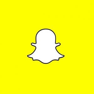 The image shows the redesigned Snapchat logo, featuring a white ghost with a thick black outline on a bright yellow background. The ghost appears to have arms outstretched. The background is entirely yellow with no other elements, representing Snapchat's bold leap on the brink of innovation.