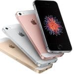 A stacked arrangement of four iPhones with different colors, including white, rose gold, gold, and black, showcasing both the back and front designs. The front screens display a colorful, flower-like explosion graphic reminiscent of the vibrant presentations seen at WWDC 18.