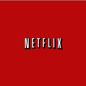 A redesigned TV app features a sleek red background with the word "NETFLIX" in bold, white letters and a slight shadow effect, perfectly centered in the middle of the image.