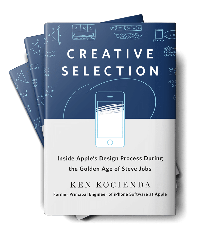 The image shows the new release design book "Creative Selection" by Ken Kocienda, with the subtitle "Inside Apple's Design Process During the Golden Age of Steve Jobs." The cover is blue, featuring white text and a simple illustration of a smartphone. Mathematical and design sketches are in the background.