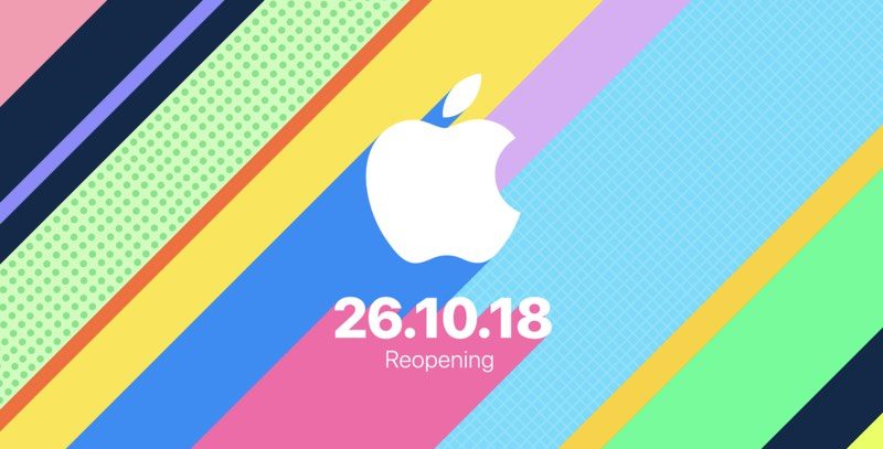 Colorful diagonal stripes with varying patterns surround the white Apple logo in the center. Below the logo, text reads "26.10.18 Reopening" at Apple's flagship store in London.