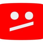 A red rectangle with rounded corners contains a white, stylized face featuring two circles as eyes and a slanted line as a mouth, resembling a frown. The image suggests disapproval or that videos with children are being removed or blocked on YouTube.