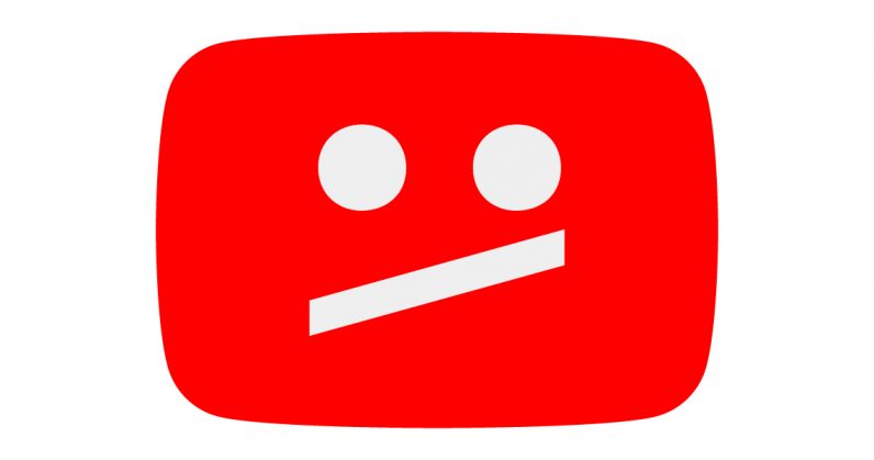 A red rectangle with rounded corners contains a white, stylized face featuring two circles as eyes and a slanted line as a mouth, resembling a frown. The image suggests disapproval or that videos with children are being removed or blocked on YouTube.