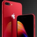 A close-up image of a discounted red 2018 iPhone model with a reflective back and a dual camera setup. The phone's screen is partially visible, showing a colorful abstract wallpaper. The Apple logo is prominently displayed on the back, while the background features a gradient of dark shades.