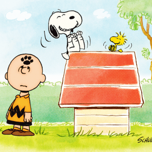 Charlie Brown stands next to Snoopy, who is joyfully dancing on top of his red doghouse, with Woodstock perched beside him. The background features green bushes, a tree, and a blue sky. The scene is lively and colorful, capturing the playful essence of the Peanuts in Space episode on Apple TV.