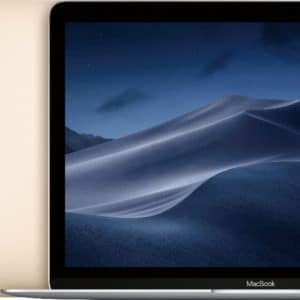 A MacBook laptop with a nighttime sand dune wallpaper displayed on its screen. Behind the laptop are four colored backgrounds fanning out, showcasing the available colors: rose gold, space gray, gold, and silver. Apple's engineering perfection is evident in every detail.