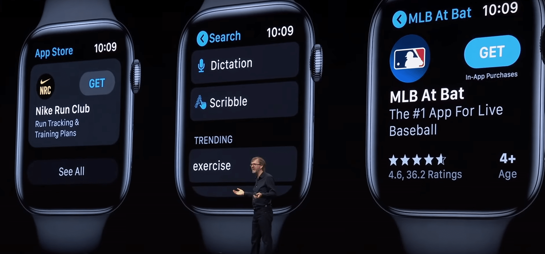 A person stands on a stage presenting Apple Watch features powered by watchOS 6. Three large Apple Watch screens are shown: one displaying the App Store with the Nike Run Club app, another showing search and trending options, and the third featuring the MLB At Bat app with ratings and age information.