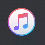 The image shows the iTunes branding logo, featuring a white music note on a circular gradient background that transitions from pink at the top to blue at the bottom. The logo is set against a dark gray background, embodying Apple's sleek design aesthetic.