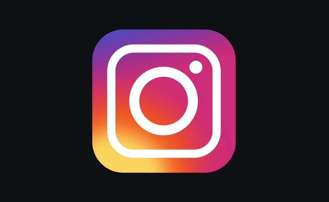 Instagram logo: a white outline of a camera with a circular lens and a dot in the top right corner, set against a gradient background transitioning from purple to pink to orange and yellow. The background is black, echoing Instagram community guidelines that stress creativity within boundaries.