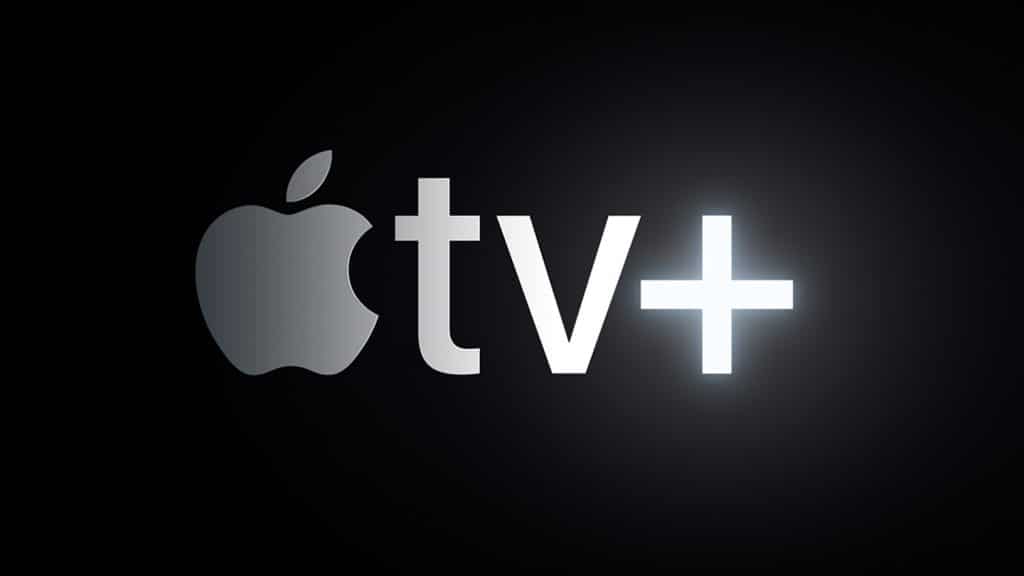 The Apple TV+ logo features a sleek, minimalist design with a light gray Apple logo followed by the letters "tv" in the same gray color and a bright, glowing "+" symbol. Launched in November, this platform offers premier Apple content against a black background that highlights the logo's elements.