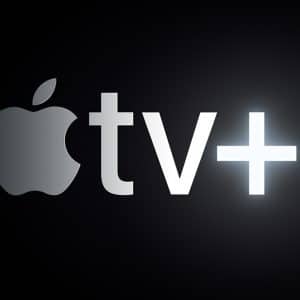 The Apple TV+ logo features a sleek, minimalist design with a light gray Apple logo followed by the letters "tv" in the same gray color and a bright, glowing "+" symbol. Launched in November, this platform offers premier Apple content against a black background that highlights the logo's elements.