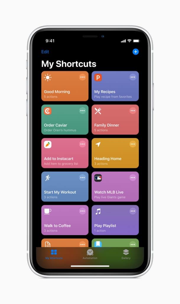 An iPhone displaying the Shortcuts app in dark mode on iOS 13.1 showcases various shortcut tiles, including "Good Morning," "Order Caviar," "My Recipes," and more, each highlighting the number of actions they perform. The latest OS update enhances functionality and aesthetics for an improved user experience.