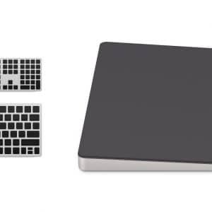 An image of Apple accessories including a computer keyboard set and a large trackpad. There is a regular keyboard, a numeric keypad, and a slim rectangular trackpad with a smooth, dark surface and metallic trim, showcased on a white background in anticipation of the Mac Pro launch.