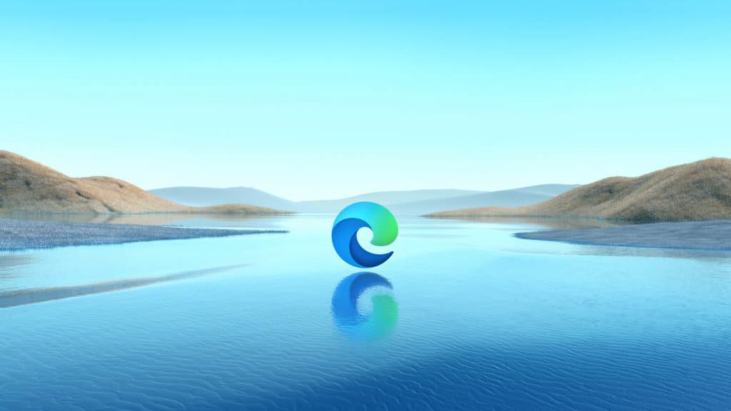 A serene body of water stretches towards distant hills, all under a clear blue sky. In the center of the image is the updated browser Microsoft Edge logo, floating above the water's surface, casting a subtle reflection.