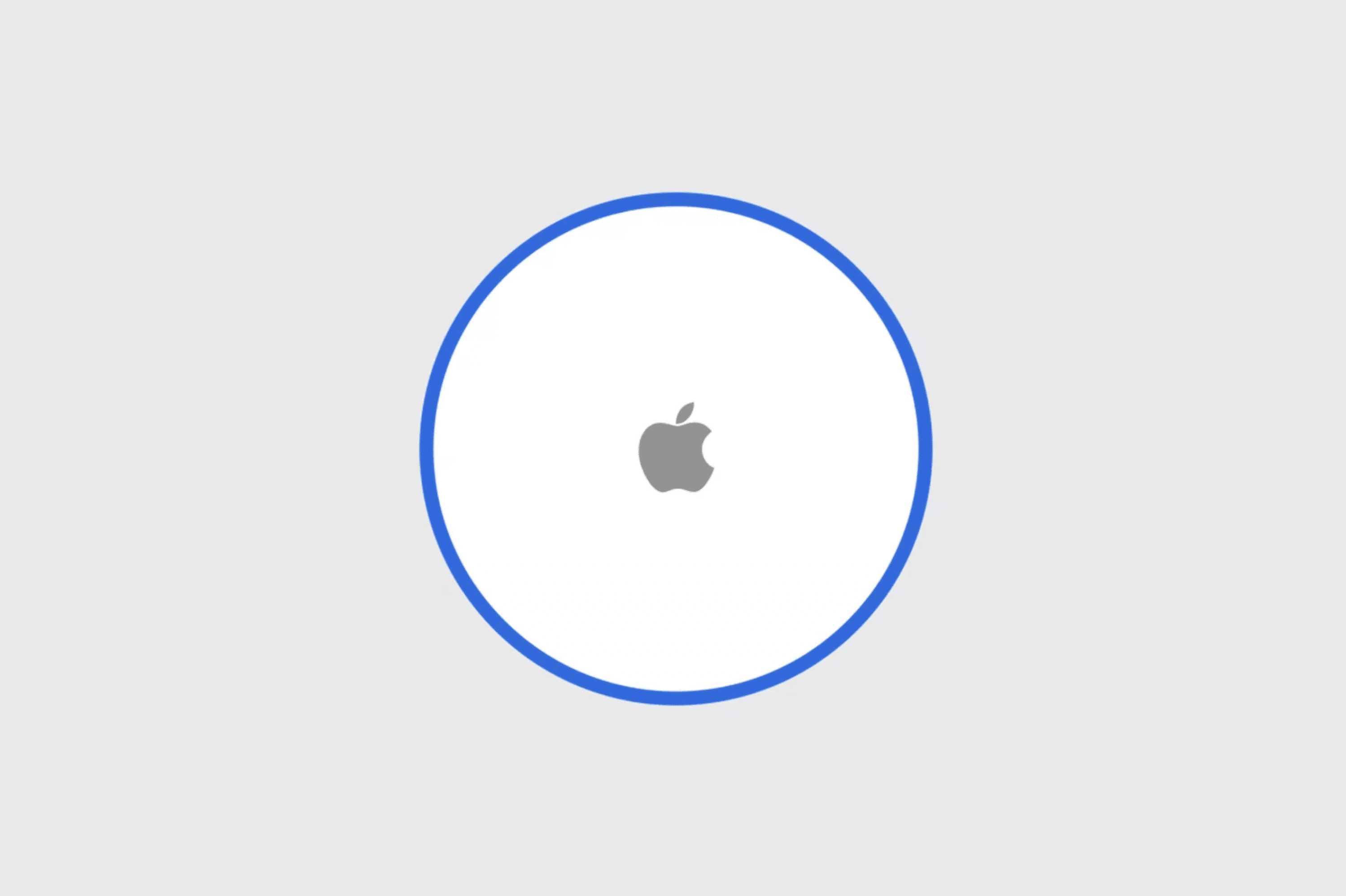 Image of Apple's AirTag. The AirTag, part of the highly anticipated Q3 launch referenced by Kuo, is a small, circular device with a white front featuring the Apple logo in the center. It has a blue outline around it and is set against a light grey background.