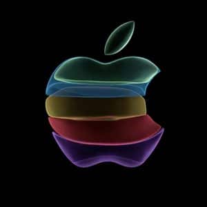 A dark image features the iconic Apple logo, rendered in semi-transparent, overlapping colorful layers. The layers form a spectrum, starting with blue at the top, transitioning to green, yellow, red, and ending with purple at the bottom.