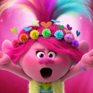 A colorful animated character with bright pink skin, vibrant pink hair, and a flower and heart headband stands against a pink backdrop. Released by Universal Pictures, the character has a surprised expression with open mouth and raised hands.