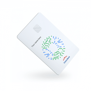 A white credit card from "CryptoBank" is shown diagonally against a white background. The branded card features a colorful circular pattern of small blue and green dots in the center. The card has a silver chip and text indicating "Your Name here.