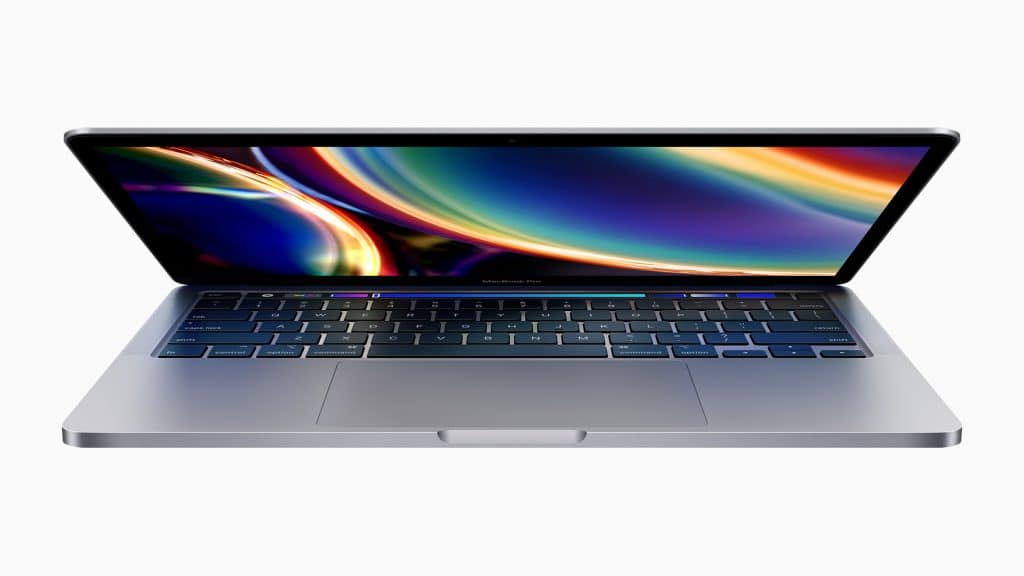 A sleek, open silver 13-inch MacBook Pro with a vibrant, multicolored display, showcasing shades of red, green, yellow, and blue. The keyboard is illuminated, and the trackpad is central. The Apple device is set against a white background.