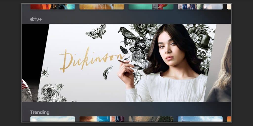 A streaming service interface displays a banner for the TV show "Dickinson" on Apple TV+. The banner, part of the Apple TV+ catalog, features a young woman in period clothing with her hand raised, surrounded by illustrations of birds, flowers, and butterflies. The word "Dickinson" is written in gold cursive.