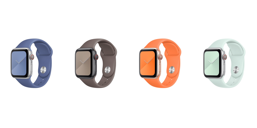 A lineup of four smartwatches with different colored straps: dark blue, brown, orange, and light mint green. All watches have a square face with rounded edges and display the same default watch face. They are shown against a white background, reminiscent of how Apple launches its sleek new Apple Watch bands.