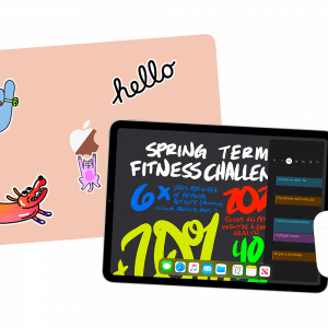 A pink laptop adorned with stickers, including a hand, dog, and "hello" note, sits beside an open iPad. The iPad displays a vibrant "Spring Term Fitness Challenge" screen with colorful text. Nearby, a pair of wireless earbuds in a branded case subtly hint at Apple Back to School promotions across Europe and Asia.