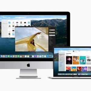 Image of an iMac and a MacBook. The iMac displays a photo editing application with a picture of a woman holding a yellow cloth, while the MacBook shows a music application featuring various album covers and the "Listen Now" page. Both devices boast the macOS Big Sur interface, seamlessly supporting Catalyst apps.