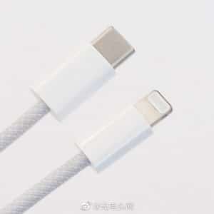 Close-up of a braided lightning cable with USB-C and Lightning connectors on a light background. The cable, designed for added durability, is ideal for Apple devices like the iPhone 12.