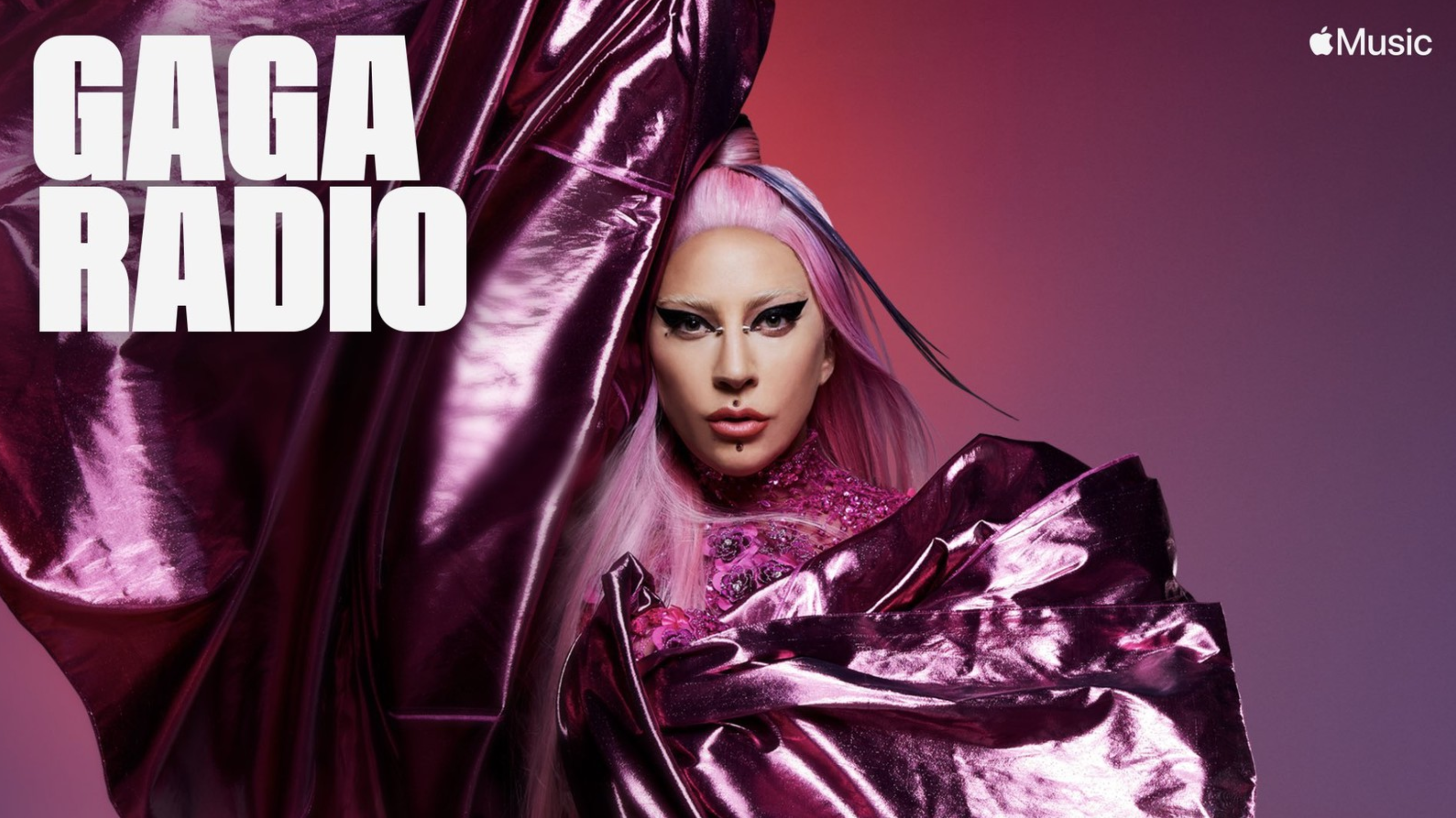 A person with long, pink hair and dramatic eye makeup stares intensely at the camera. They are wrapped in shiny, metallic pink fabric. Large white text on the left reads "Gaga Radio," showcasing Lady Gaga's exclusive show on Apple Music. The background is a gradient of pink and purple.