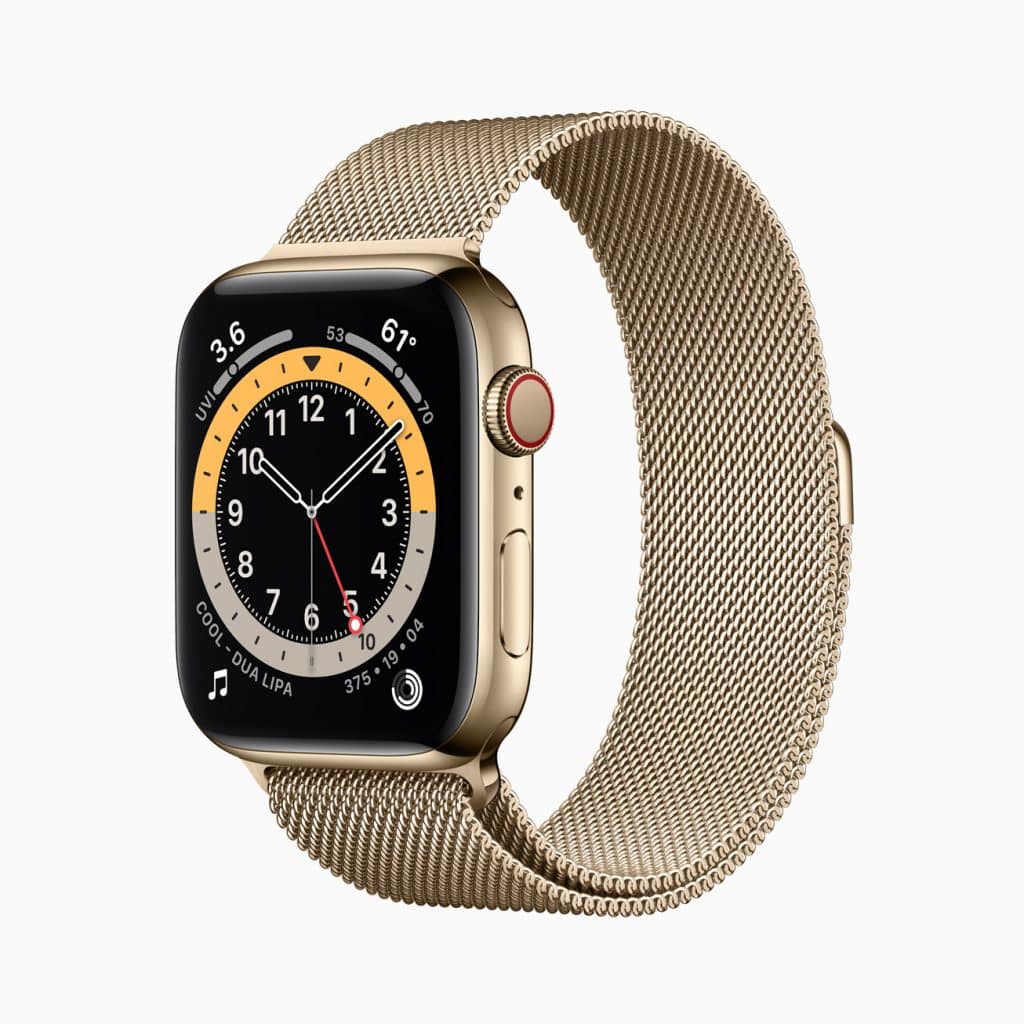 A gold-colored smartwatch with a matching gold mesh band. The smartwatch has a rectangular face displaying an analog clock, weather details, and other widgets. The side button and digital crown are visible on the right. The background is white.