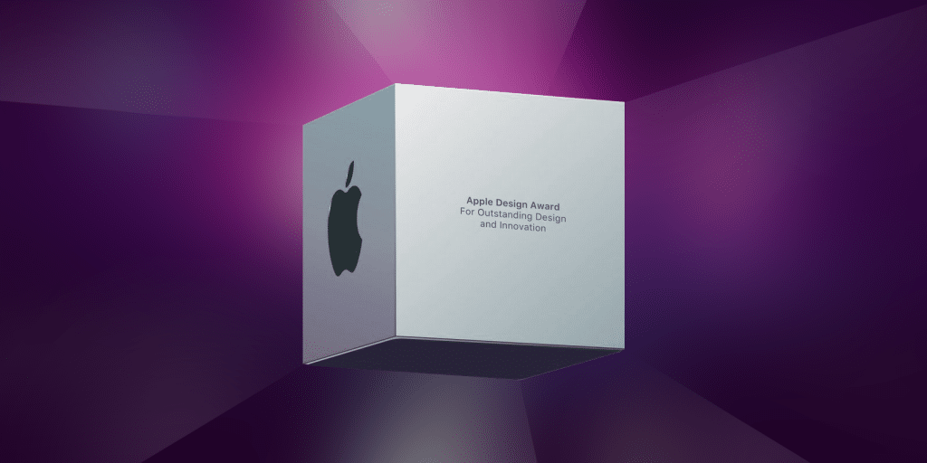 A metallic cube-shaped 2020 Apple Design Award trophy with the Apple logo on one side and the inscription "Apple Design Award For Outstanding Design and Innovation" on another. The background features a gradient of purple shades with rays converging towards the cube, celebrating award-winning apps.