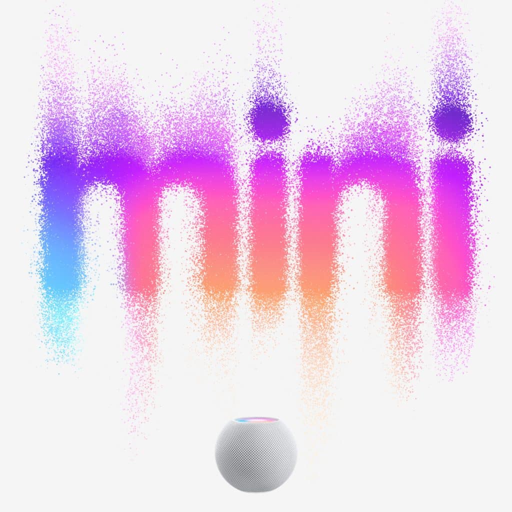 A smart speaker against a white background. Above it, colorful, pixelated text spells "mini" in a gradient of blue, purple, pink, and orange hues. The smart speaker is small and round with a mesh exterior and a touch-sensitive top displaying similar colors.