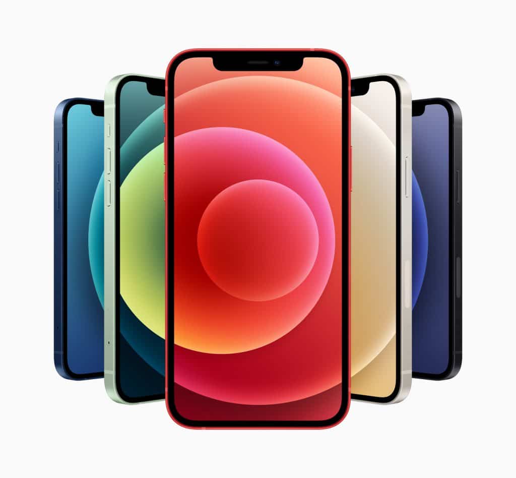 A group of five iPhones displayed in a semicircle. The central iPhone in the foreground has a red design and displays a colorful circular pattern on its screen. The surrounding iPhones are shown in black, white, blue, and green colors.