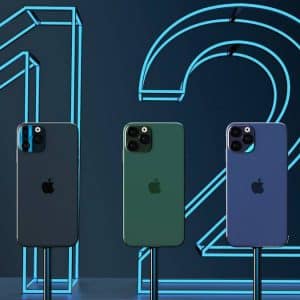 Five iPhone 12 models are displayed on stands against a dark background with a neon blue "12" in the back. The range showcases five different colors: silver, black, green, blue, and gold. They all feature a triple camera system on the back.