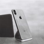 Silver iPhone X on stand