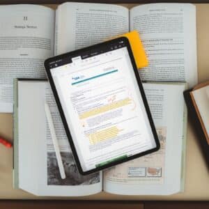 iPad displaying Live Text iPadOS copy text feature, extracting text from a photographed business card, showcasing seamless productivity in 2025.