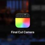 A mobile application icon with a rainbow-colored gradient square and a black ruler-like top, representing "Final Cut Camera." The background is blurred with dark shades and hints of blue and orange, suggesting a video editing interface.