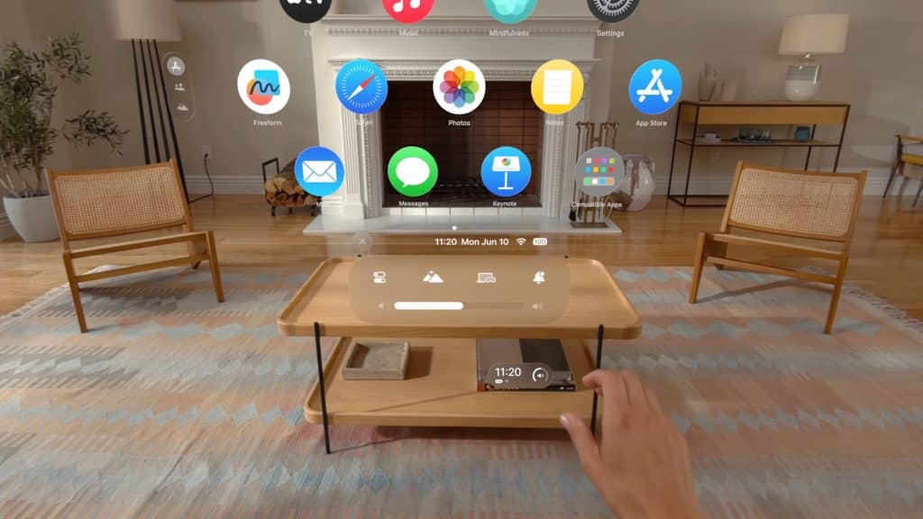 A person is using an augmented reality headset in a living room with wooden furniture and a patterned rug. The Apple Intelligence AR interface displays various app icons like Mail, Photos, and App Store floating in the air before them.