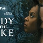 Promotional poster for the Apple TV+ series "Lady in the Lake" featuring side profiles of Natalie Portman and Moses Ingram, with moss and dark tree branches merging into their hair. The title text is prominently displayed alongside their names.