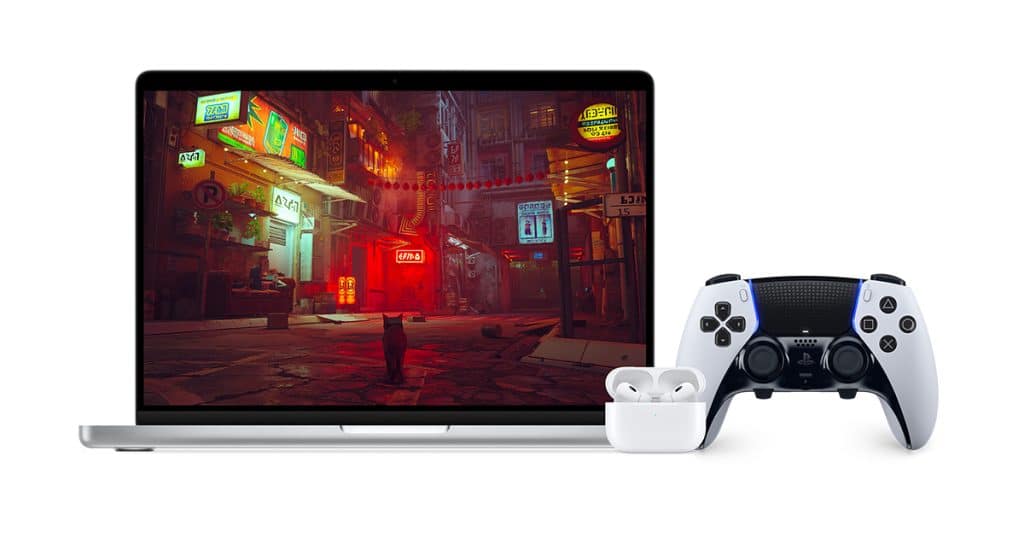 A laptop displaying a video game scene featuring a cat standing in an illuminated, neon-lit urban alleyway. In front of the laptop are a pair of wireless earbuds in a charging case, an iPhone with notifications from the latest Apple event, and a game controller.