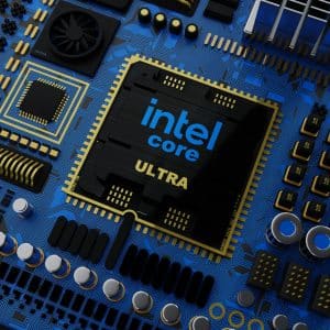 Close-up of a blue motherboard featuring a black and gold Intel Core Ultra processor chip at the center. Various electronic components, including capacitors and connectors, are arranged around it, showcasing intricate circuit details amid headlines of Intel job cuts affecting thousands.