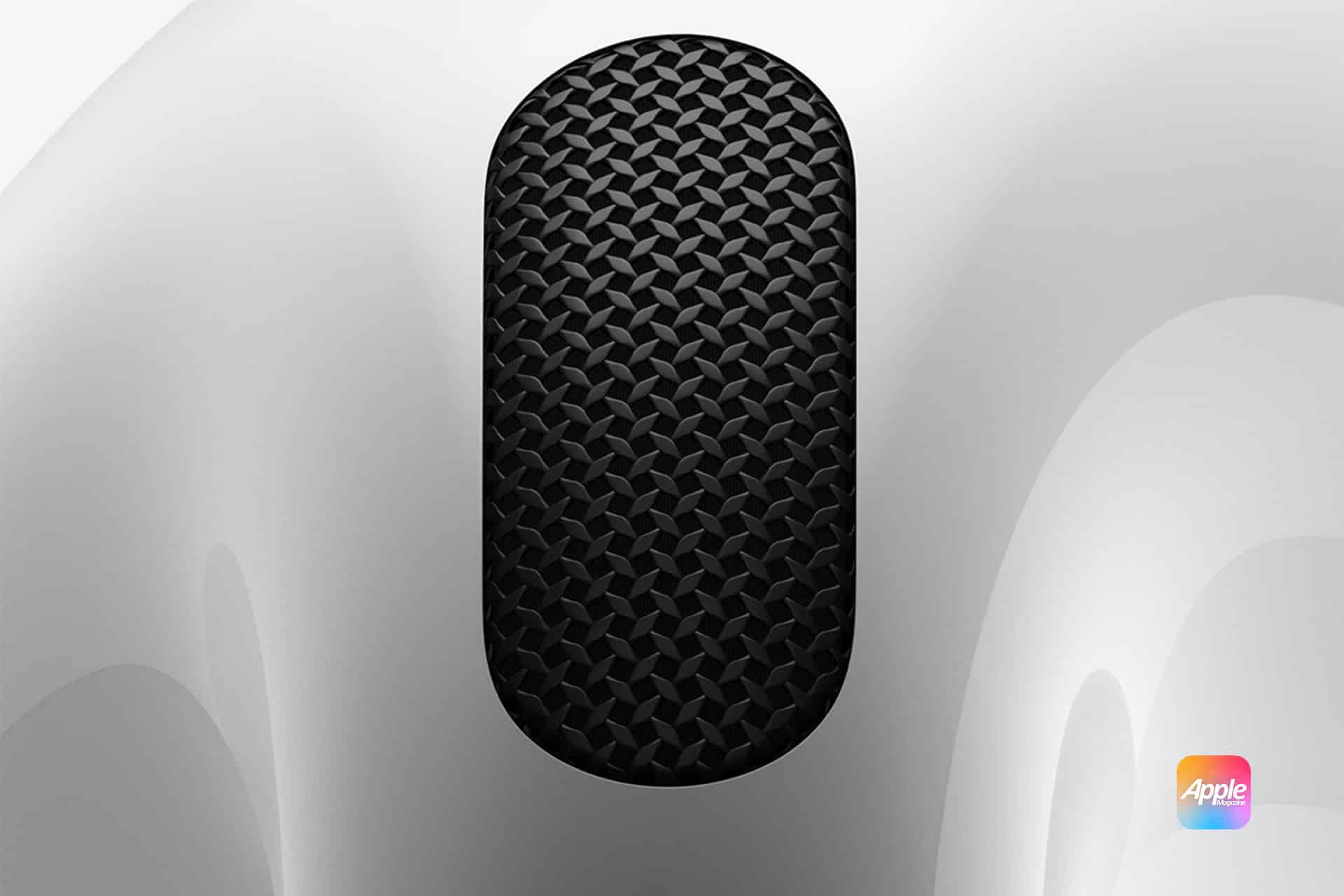 Close-up of the top of an Apple product, featuring a black, textured, oval-shaped button on a smooth white surface. Displaying the Apple logo with a colorful gradient in the lower right corner, this design elegantly showcases Apple's minimalist aesthetic—perfect for comparing AirPods 4 vs. AirPods Pro.