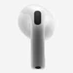 A person wearing Apple AirPods, with a translucent iOS 26 interface in the background, showcasing new features like sleep detection, camera controls, and head gestures, set to debut at WWDC 2025.