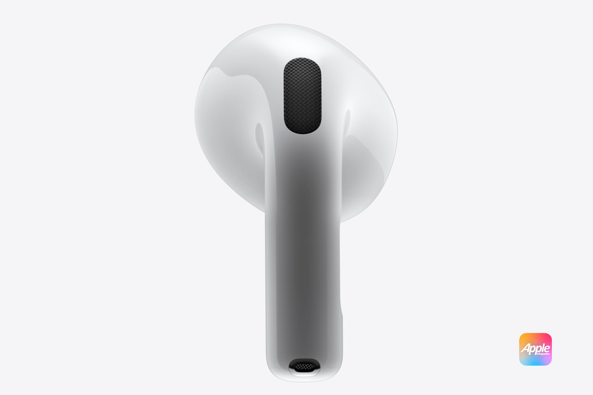 AirPods 4 with ANC: A close-up of a white Apple AirPod against a white background, showcasing the speaker grille and the end of the stem. The AppleMagazine logo in a gradient color appears in the bottom right corner, highlighting the subtle differences between AirPods 4 vs. AirPods Pro.