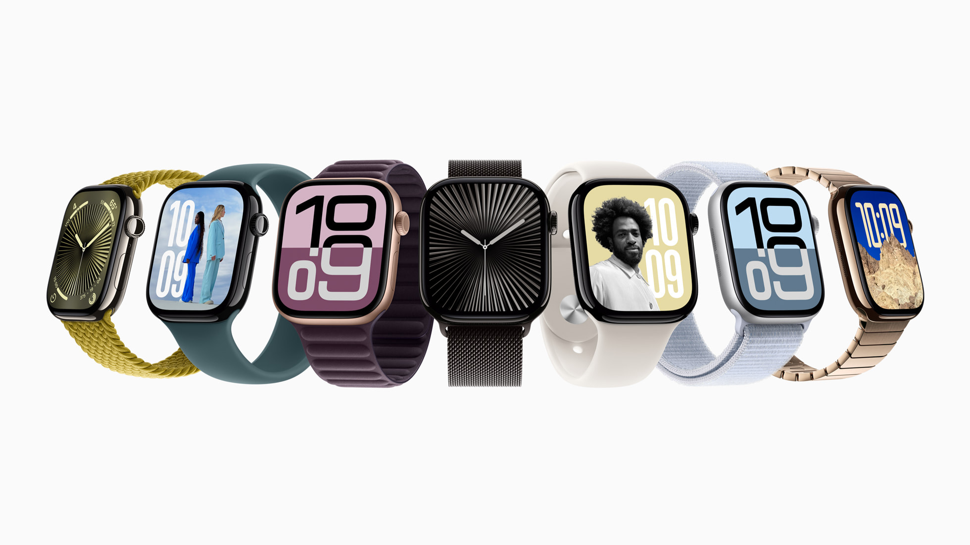 A lineup of seven smartwatches with different colored bands and various face designs is displayed against a white background. The watch screens show different visuals, including abstract designs, a photo of a person, and large digital time displays.