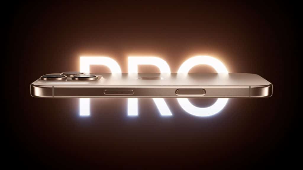 An iPhone 16 Pro is displayed horizontally against a dark background with the word "PRO" illuminated behind it. Announced with major features, the phone's sleek design showcases a metallic finish with camera lenses and buttons visible on the side.